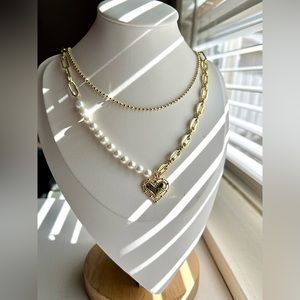 Double drop chain various types of links. 14k Laminated Gold. Clamp closure.